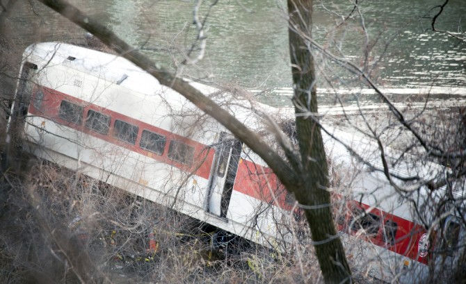 A Metro North train derails killing and injuring people near Spuyten Duyvil Station. Taken December 1, 2013, in the Bronx, New York. eddtoro / Shutterstock.com