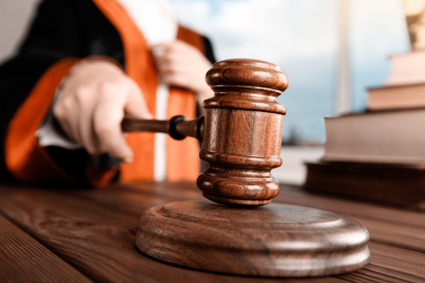 judge striking gavel