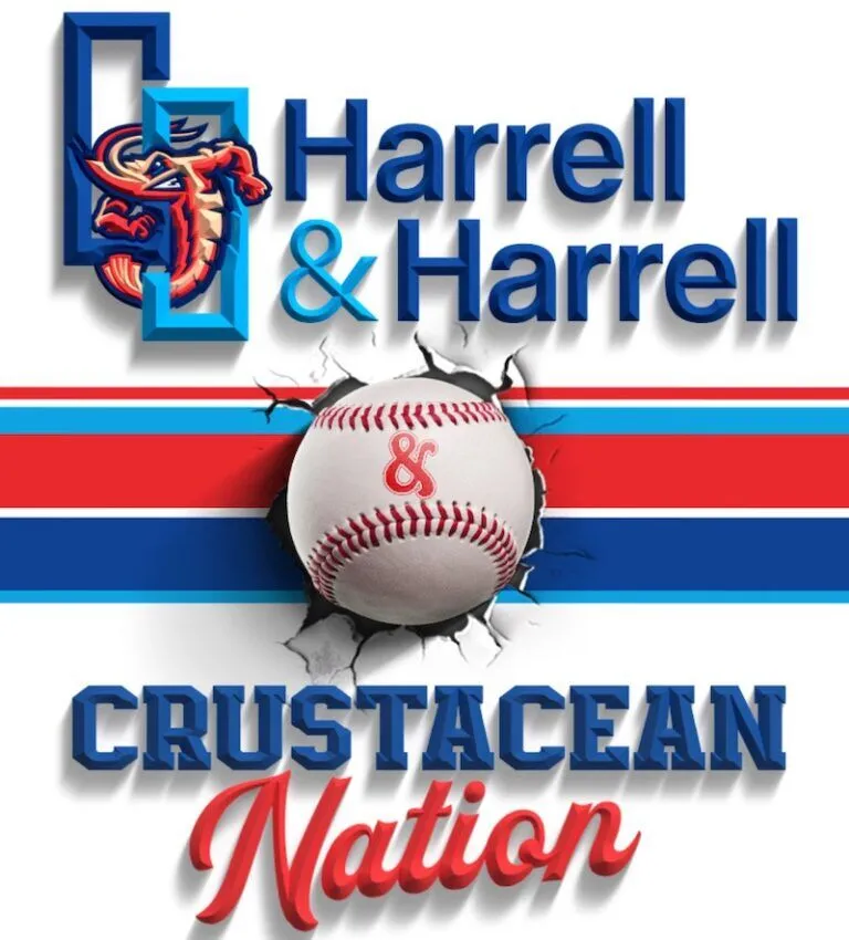 Cracked baseball splits red and blue stripes with crab.