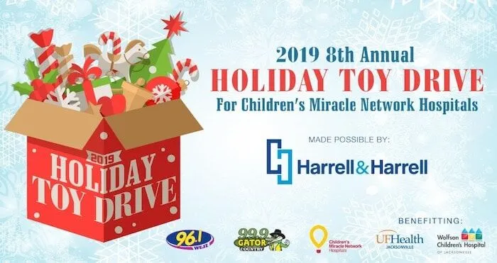 Toy drive ad with toy box and sponsor logos.