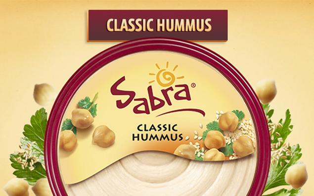 Sabra Classic Hummus container with chickpeas, parsley, and sesame seeds.